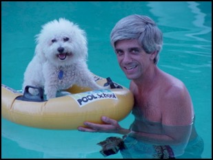 Dog on float with man in pool
